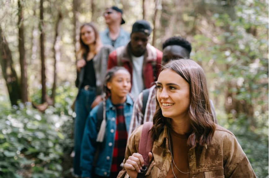 A group of friends hiking together outdoors.